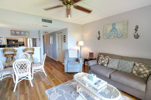 view of open living room dining room and kitchen at st augustine vacation rental at creston house
