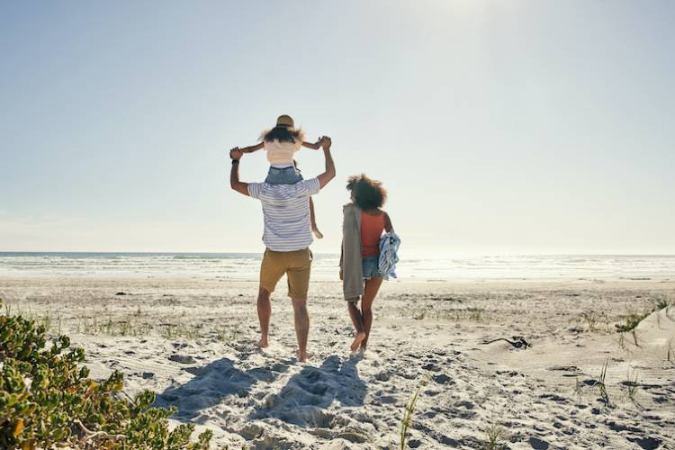 A family enjoys a day on the beach in St. Augustine