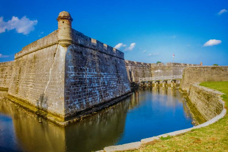 Water filled moat surrounds the Castillo De San Marcos National Monument, Florida