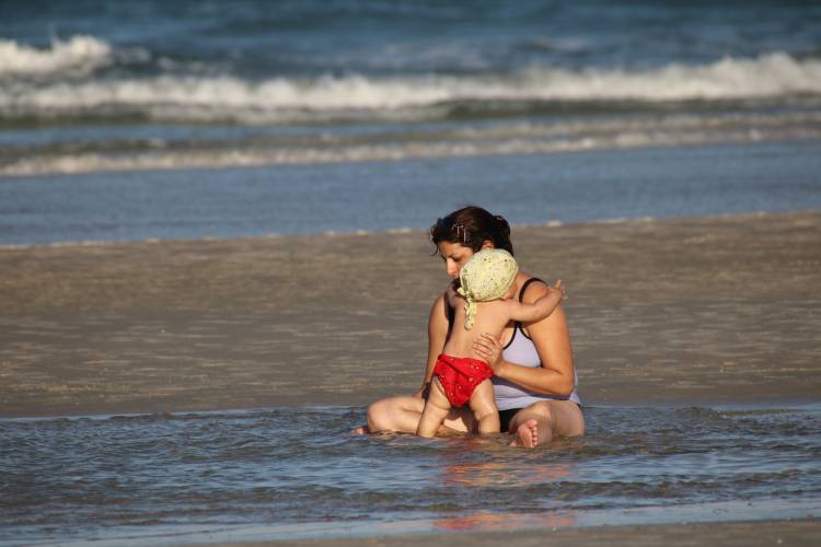 A mother and daughter enjoy the beach at St. Augustine
